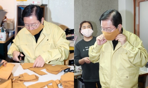 장종태 구청장이 수제마스크를 만들어 착용해 보고 있다.