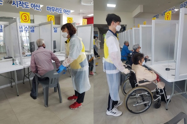 자원봉사자들이 예방접종센터에서 백신접종 봉사활동을 펼치는 사진