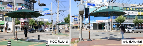 한 시민이 그늘막에서 햇볕을 피하는 모습