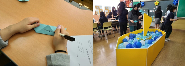 ‘세월호 기억하기’ 교육활동에서 학생들이 종이배를 접어 추모의 글을 남기는 모습
