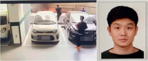 유성 주류업체서 난 불을 부산남부경찰서 광남지구대 김상민 경장이 아파트 주민들과 함께 끄고 있다.