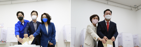 (좌측부터) 민주당 허태정 대전시장 후보와 부인 양창희씨, 아들 허인범씨가 투표함에 투표용지를 넣고 있다. 국민의힘 이장우 대전시장 후보와 부인 김세원 씨가 투표함에 투표용지를 넣고 있다.